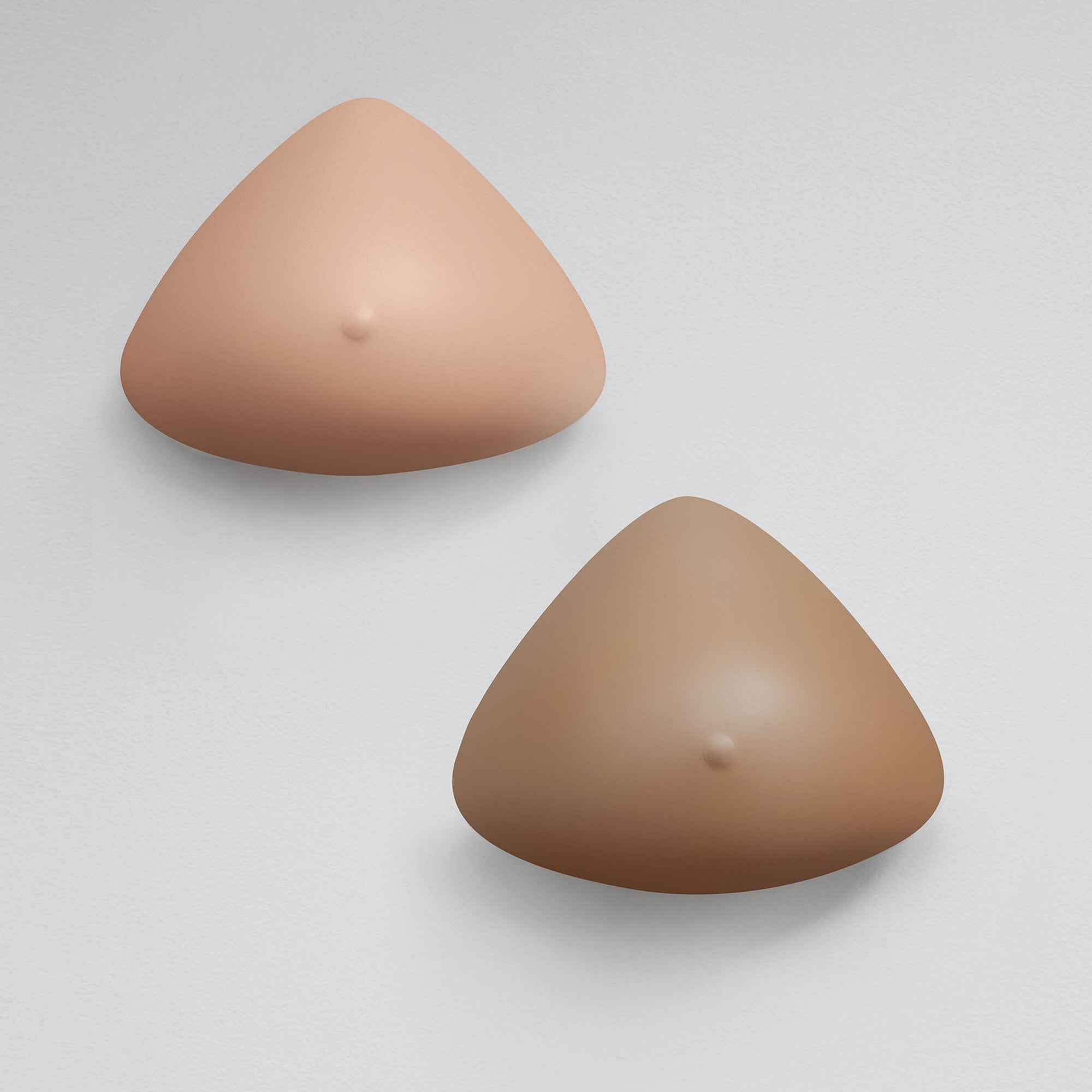 Natura Light Breast Form, shown in Tawny, front and back view.