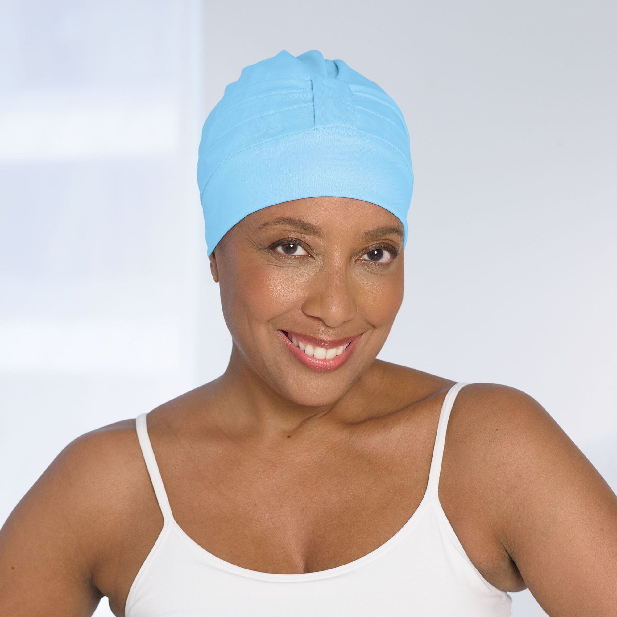 Front view #8197 Swim Cap with Velcro® shown in light blue.