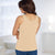 Back view of the #9407 Cool Comfort Pocketed Tank Top shown in white.