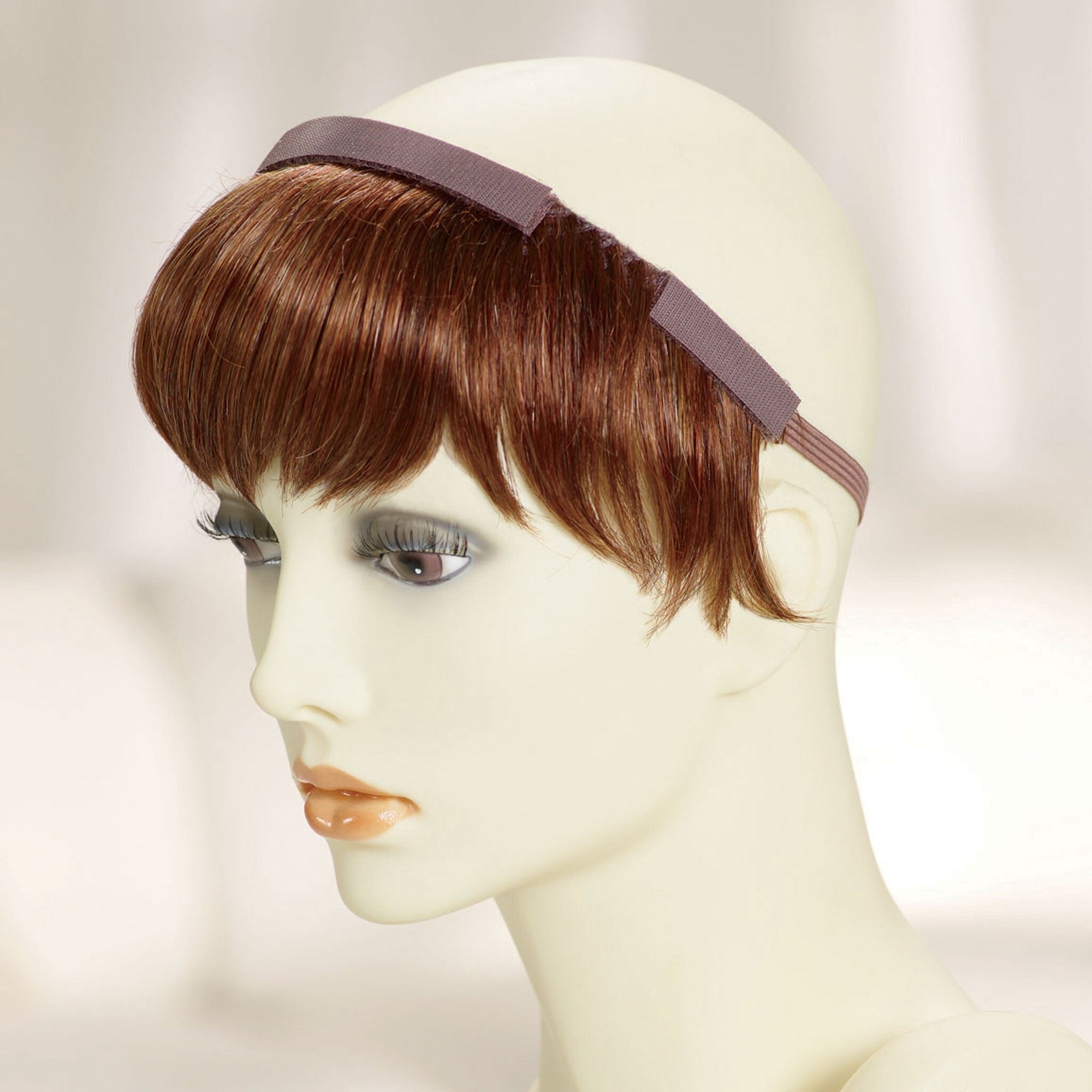 Add-a-Bangs can also be worn straight in the back.