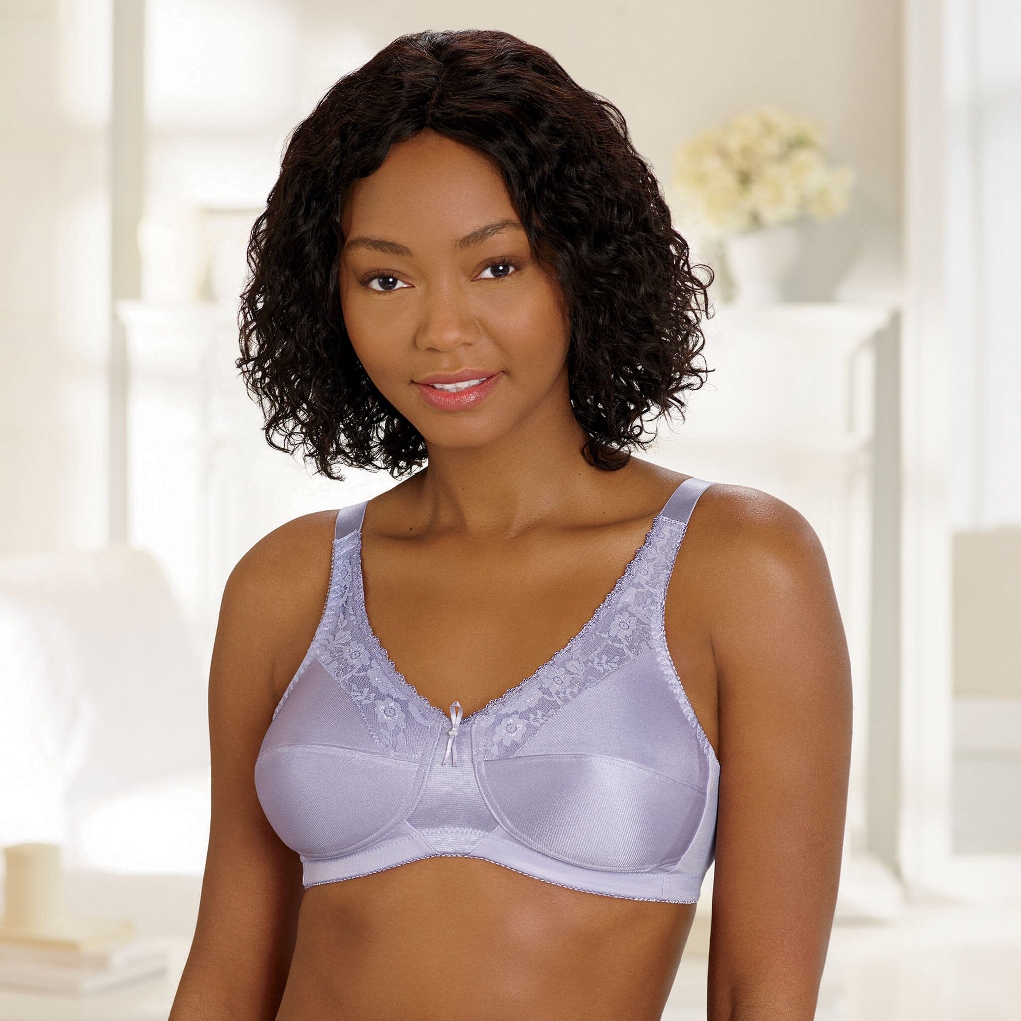 Long bra 40B with various lace appliqués, breathable full cup, and  underwire