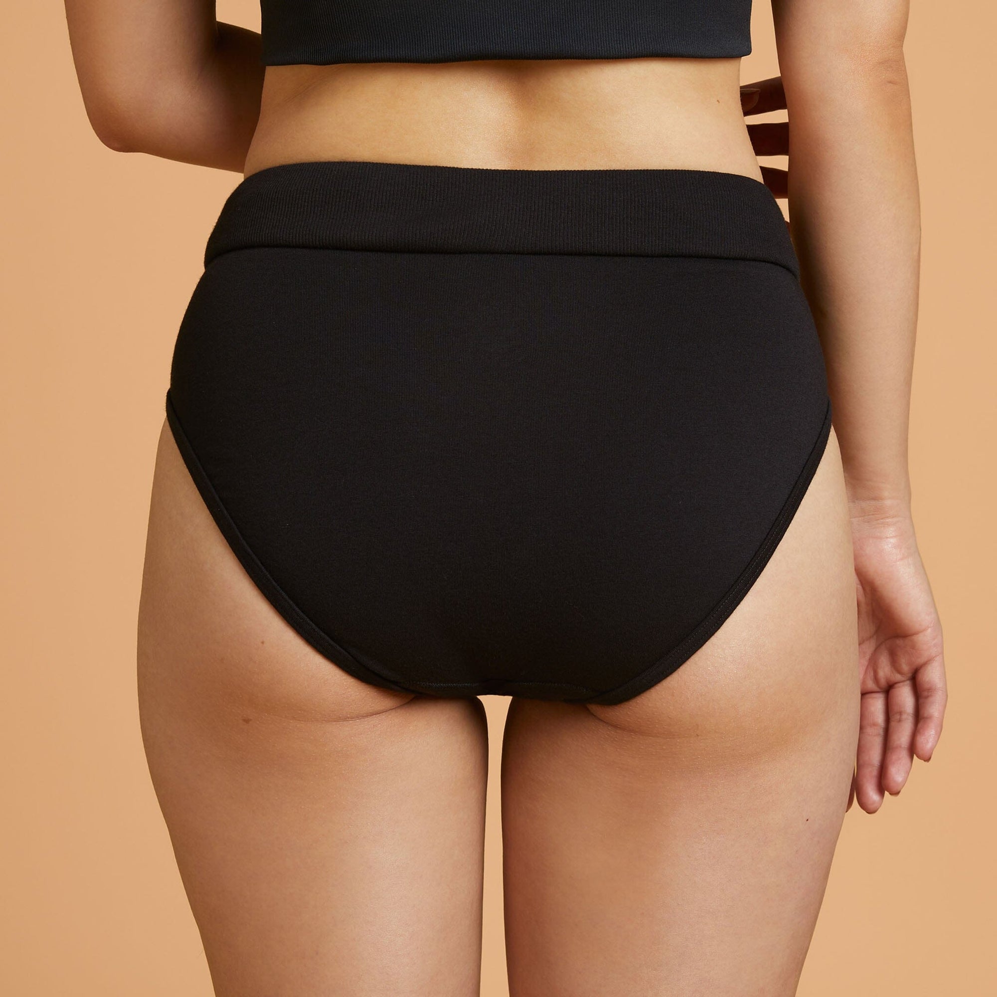 High Waist Velcro Panty with Velcro closure. Shown in black, back view.
