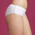 Hipster Panty with hook fasteners. Show in beige, side view.