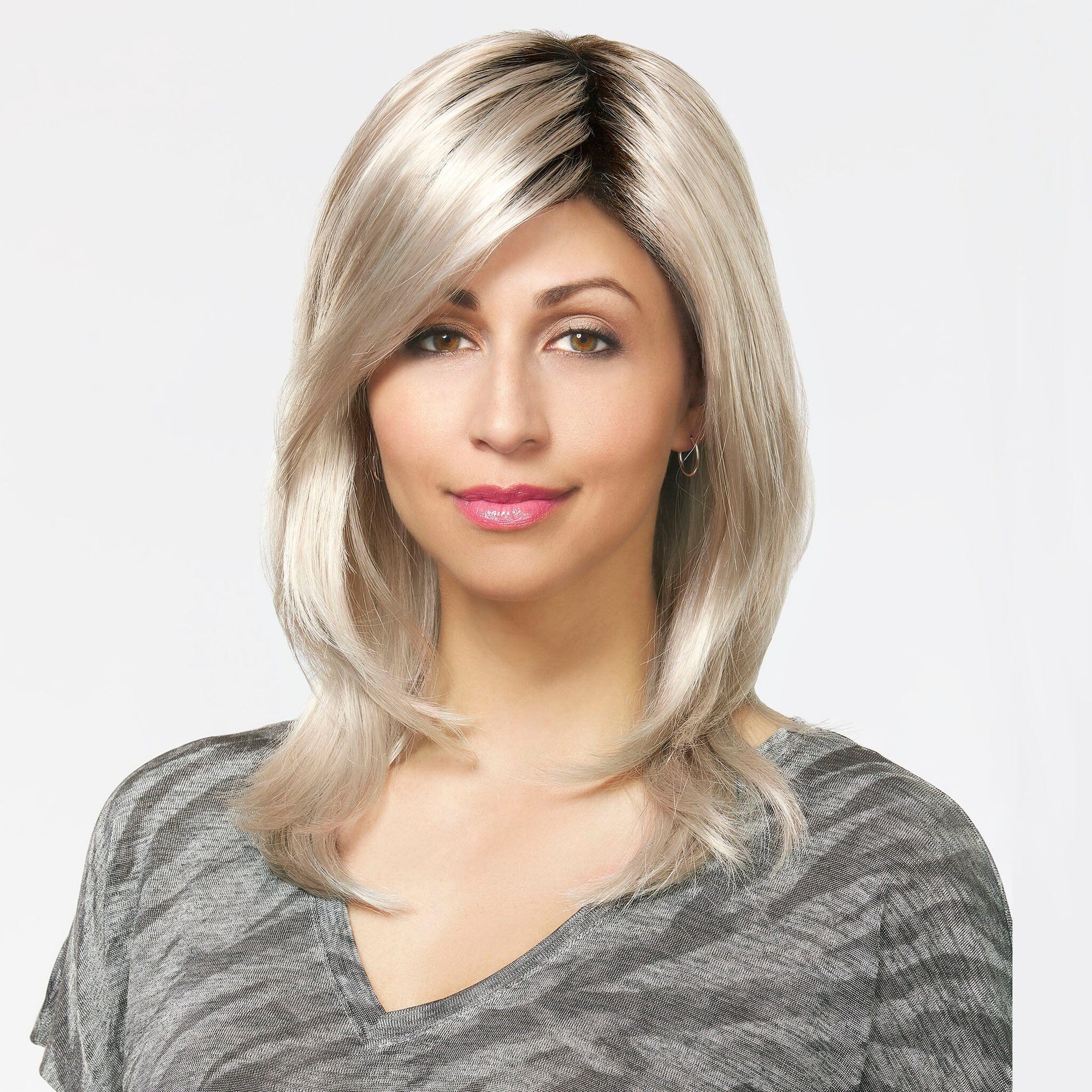 60/101GR Silver tones with light platinum highlights and brown roots